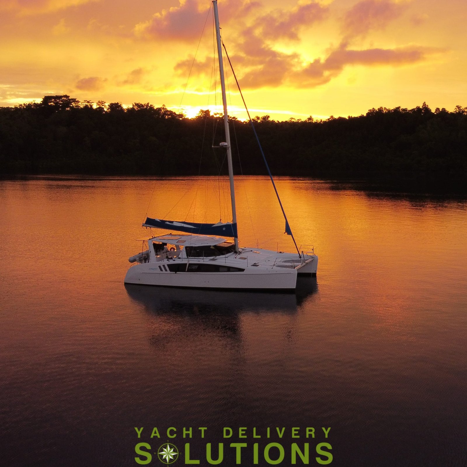 Seawind 1260 from a drone at sunset taken by yacht delivery skipper