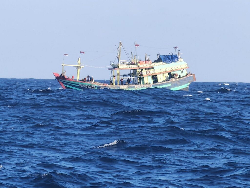 wooden fishing boat in the java sea during a yacht delivery