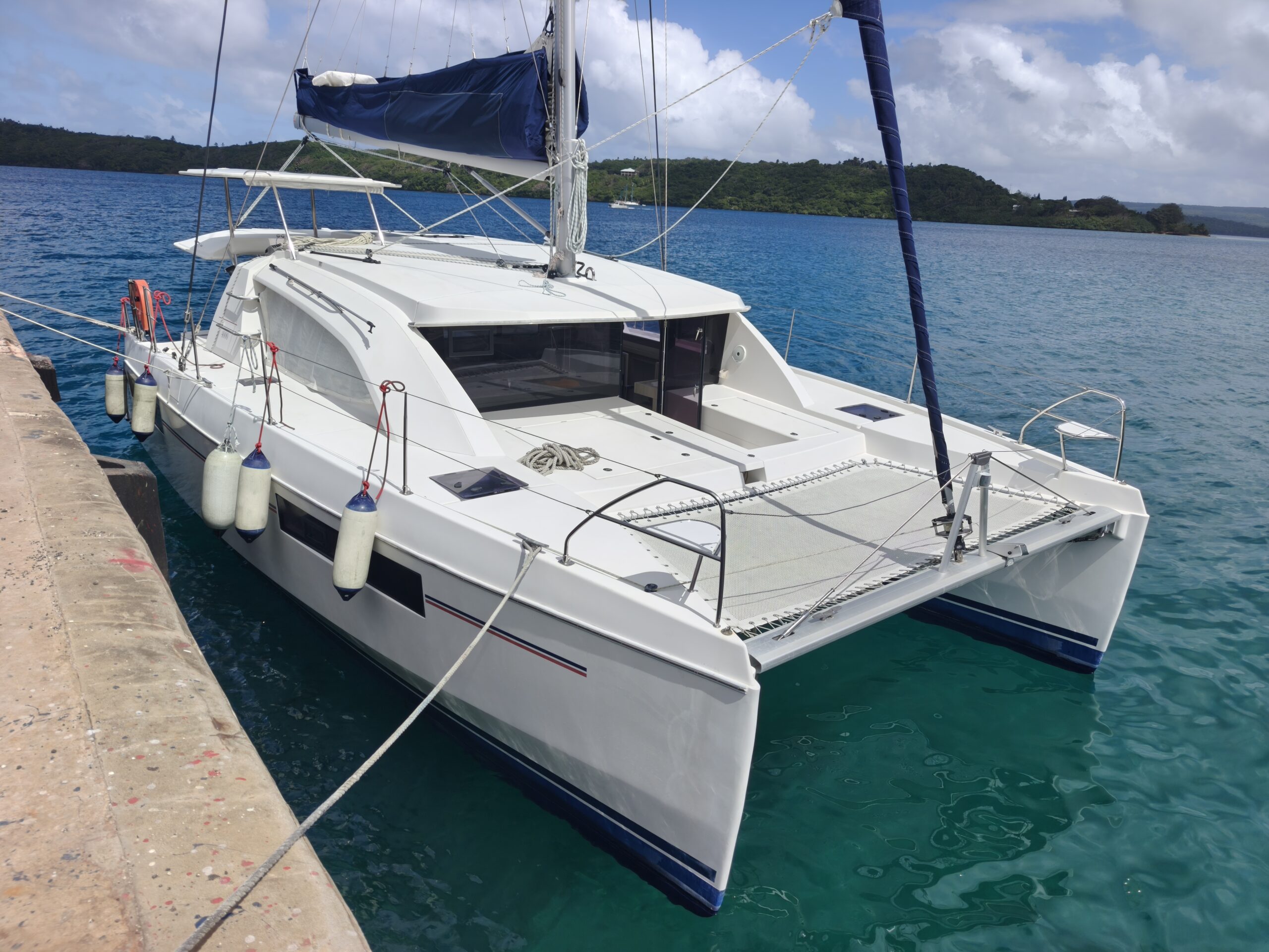 leopard 40 tied to a concrete wharf on a yacht delivery in asia